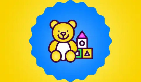 Yellow teddy bear sitting next to colorful building blocks.